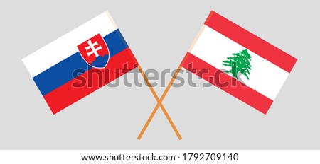 Crossed flags of Lebanon and Slovakia