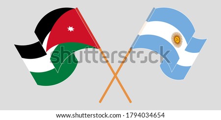 Crossed and waving flags of Jordan and Argentina