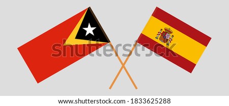 Crossed flags of East Timor and Spain
