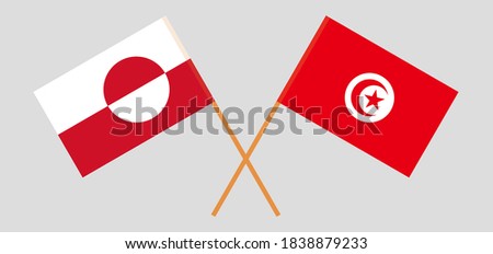 Crossed flags of Tunisia and Greenland