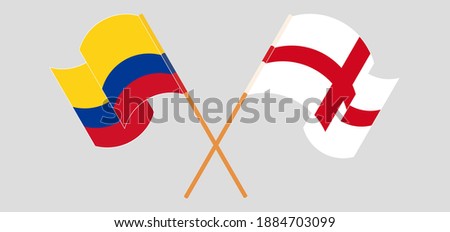 Crossed and waving flags of Colombia and England