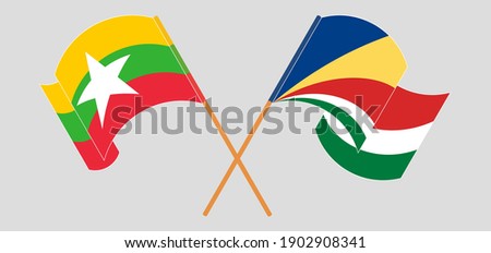 Crossed flags of Myanmar and Seychelles