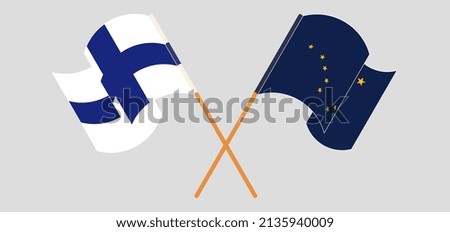 Crossed and waving flags of Finland and the State of Alaska. Vector illustration
