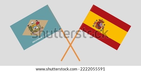 Crossed flags of The State of Delaware and Spain. Official colors. Correct proportion. Vector illustration
