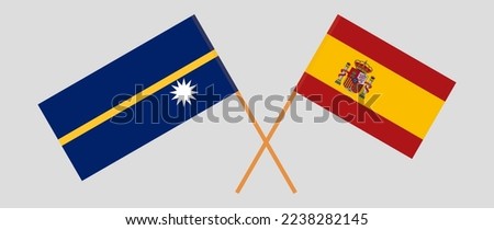 Crossed flags of Nauru and Spain. Official colors. Correct proportion. Vector illustration
