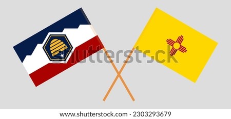 Crossed flags of The State of Utah and the State of New Mexico. Official colors. Correct proportion. Vector illustration
