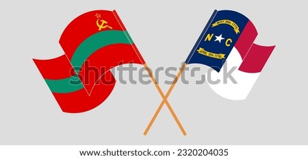 Crossed and waving flags of Transnistria and The State of North Carolina. Vector illustration
