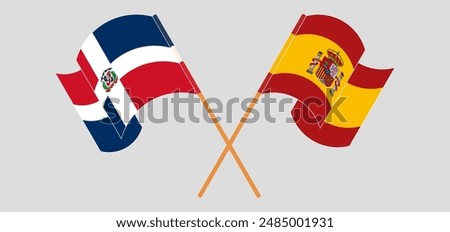 Crossed and waving flags of Dominican Republic and Spain. Vector illustration
