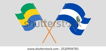 Crossed and waving flags of Gabon and Republic of El Salvador. Vector illustration.
