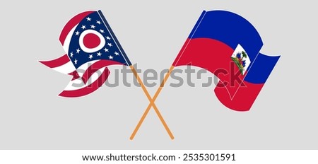 Crossed and waving flags of the State of Ohio and Republic of Haiti. Vector illustration.
