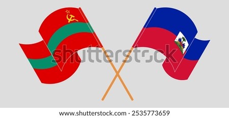 Crossed and waving flags of Transnistria and Republic of Haiti. Vector illustration.
