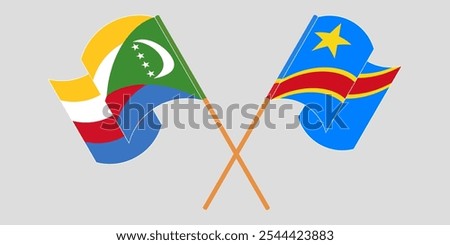 Crossed and waving flags of the Comoros and Democratic Republic of the Congo. Vector illustration.
