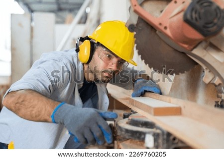 Image, Stock Photo Male carpenter working with wood in garage