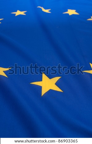 Detail of Silky Flag of Blue European Union EU Flag Drapery - Shallow Depth of Field