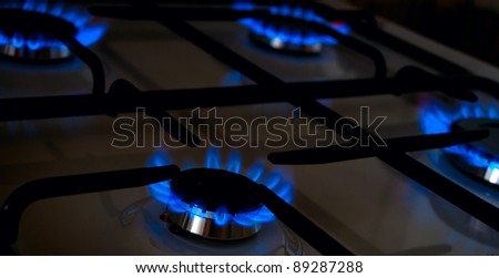 Blue Flames of Gas Stove in the Dark