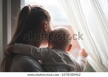 Similar – Image, Stock Photo Self isolate, with a face mask, in front of the silent last lights of day, near Manchester airport, UK, while waiting for the results of a pcr test from covid-19