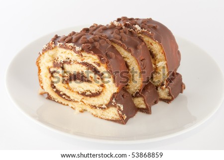 Chocolate swiss roll on a plate