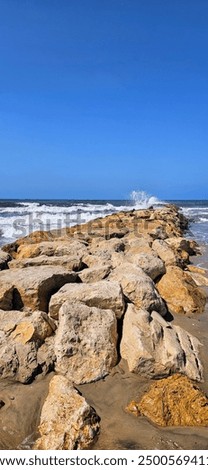 Similar – Foto Bild Felsige Küste unter blauem Himmel