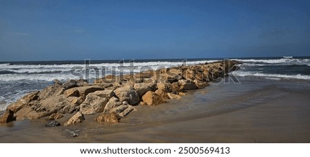 Similar – Foto Bild Felsige Küste unter blauem Himmel