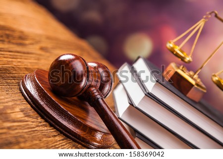 Mallet, legal code and scales of justice. Law concept, studio shots