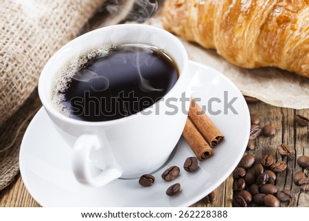 Delicious coffee with sweets on a wooden table, studio shoot by dSLR camera