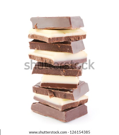 Double white and black chocolate bars in a stack isolated on white background