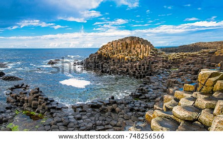 Landscape of Giant's Causeway trail with a blue sky in summer in Northern Ireland in United Kingdom. UNESCO heritage. Сток-фото © 