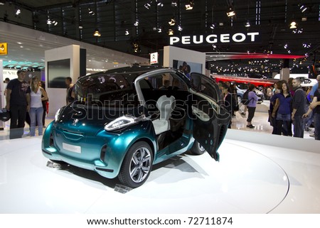 PARIS - OCT 10: Peugeot Concept Electric Car on display at the Paris Motor Show at Porte de Versailles on October 10, 2010 in Paris.