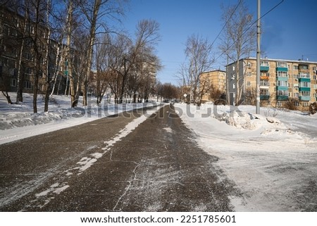 Foto Bild Verschneite Kleinstadt am Fjord vor Bergen zur blauen Stunde