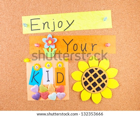 Enjoy your kid, words and decoration on cork