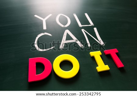 You can do it concept, colorful words on blackboard