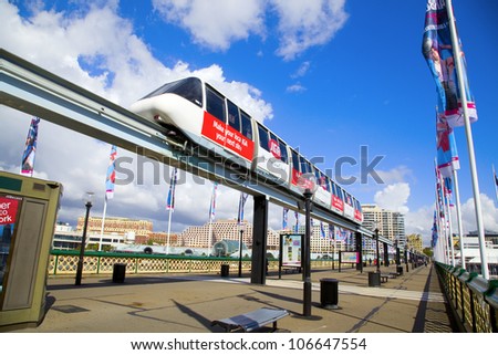 SYDNEY, AUSTRALIA - MARCH 22: A monorail runs above the public street in Darling Harbour area of Sydney on March 22,2012 in Sydney. The monorail is a unique public transport system in Sydneys CBD.