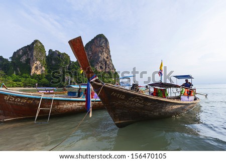KRABI, THAILAND - JULY 7 : Unidentified tourists and longtail boat ride on the shuttle service tourists to the islands on July 7,2013 in Krabi ,Thailand.