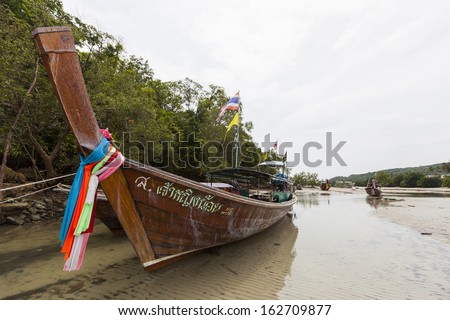 KRABI, THAILAND - JULY 7 : Traditional shuttle service longtail boat serves for the tourist for sightseeing the islands on July 7,2013 in Krabi ,Thailand.