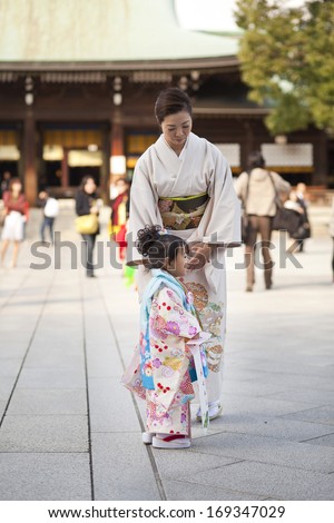 TOKYO, JAPAN - NOV 11: Japanese woman in kimono for a celebration of a typical wedding ceremony at Meiji Jingu Shrine, Tokyo, Japan on November 11,2013. Meiji Jingu Shrine was first built  in 1915.