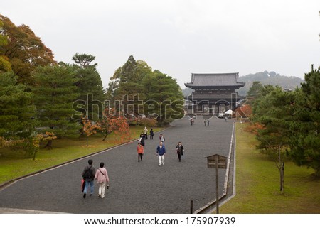 KYOTO, JAPAN - NOV 10 :Tourists enjoy sightseeing amid the rain at Ninna-ji temple on November 10, 2013 Kyoto ,Japan.  Ninna-ji temple was founded in AD 888 by the retired Emperor Uda.