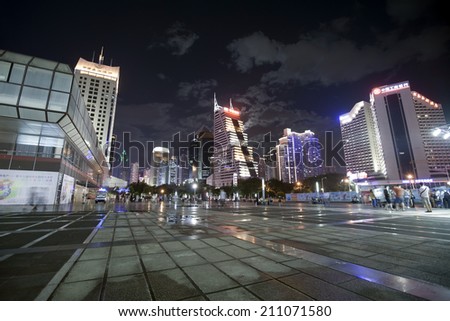 SHENZHEN, CHINA - JULY 14 : Hi-rise building in city center at night time on July 14,2014 in Shenzhen,China. Shenzhen is China's financial center and first's  special economic zone.