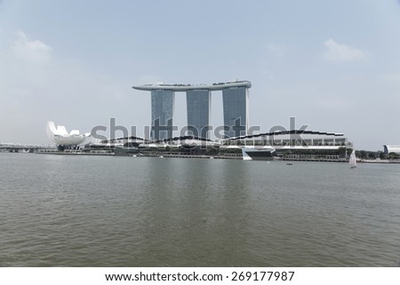 Singapore - MAR 23 :Day view of Singapore Marina Bay Sand on March 23,2015 in Singapore. Marina Bay Sands is billed as the world\'s most expensive standalone casino property at S$8 billion.