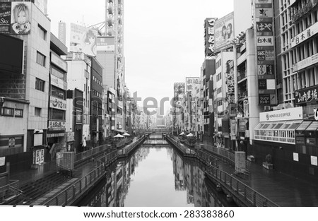 OSAKA,JAPAN - APRIL 20,2015 :Dotonbori canal is a popular nightlife and entertainment area characterized by its eccentric atmosphere and large illuminated signboards.