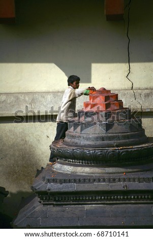 KATHMANDU, NEPAL - DECEMBER 31: Cremations in progress at Pashupatinath Temple on the banks of River Baghmati, December 31,2008 in Kathmandu, Nepal.