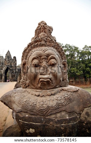 Head of demon statue at gate to Angkor Thom, Angkor, Cambodia