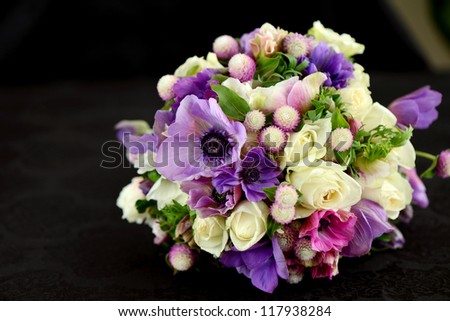 Colorful flowers bouquet on a black background