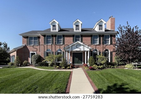 Front view of luxury brick home