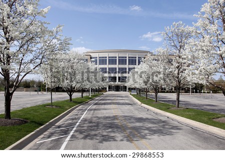 Office building with blooming trees in spring