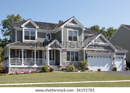 Suburban Home With Wraparound Porch And Columns Stock Photo 36192781 ...