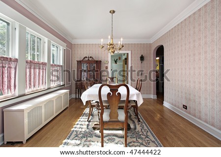 Dining room in older home with arched entry