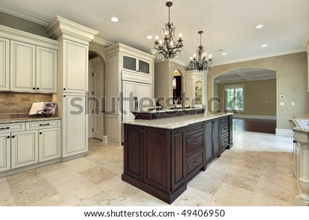 Kitchen in new construction home with double deck island