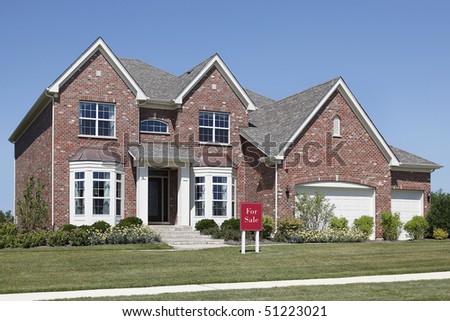 Brick home in suburbs with \