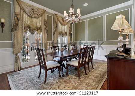 Dining room in luxury home with french doors