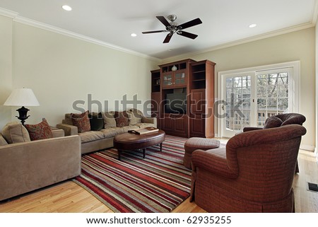Family room in suburban home with door to deck
